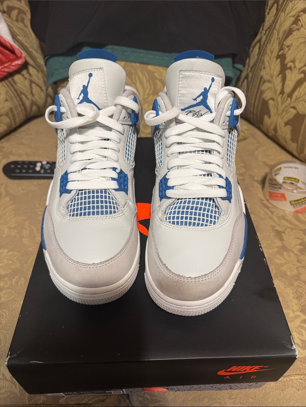 Jordan Men’s Retro 4 White and Blue Sneakers